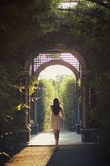 Photo by Dominik Bednarz woman walking alone on pathway